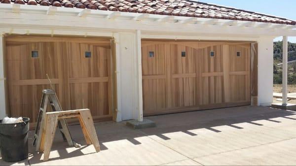 Our installers hard at work on these custom ranch house doors.