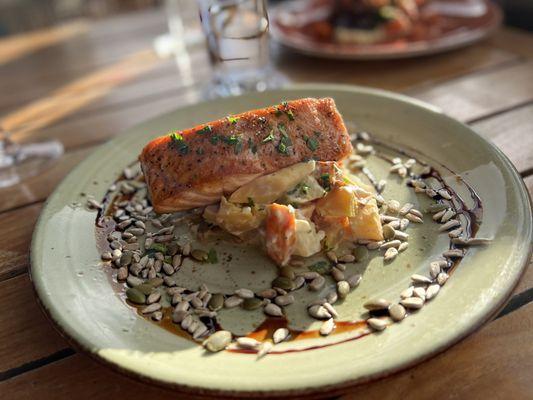 Scottish salmon with root vegetables,goat cheese, nuts and a splash of balsamic.