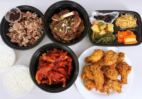 Clockwise: L.A. Galbi ($34.99), Banchan, KFC ($25.99), Dakbal - chicken feet ($19.99), Dak Dong Jjip - chicken gizzard "stir-fry" ($14.99)