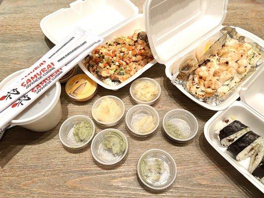 The foods (L to R): miso soup, spicy baked crawfish roll, baked scallop roll, and eel roll.