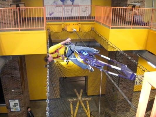 Learn about counterbalance and center of gravity when you ride the HighWire Bike.