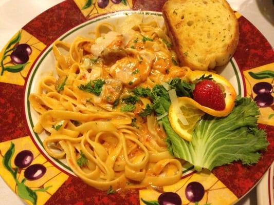 Shrimp and Sausage Alfredo with garlic bread.