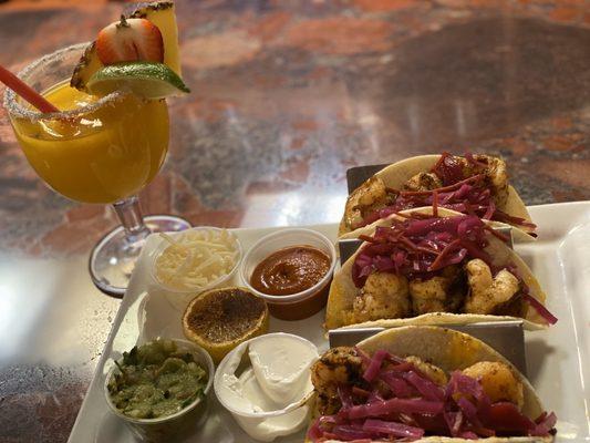 Mango margarita and shrimp tacos