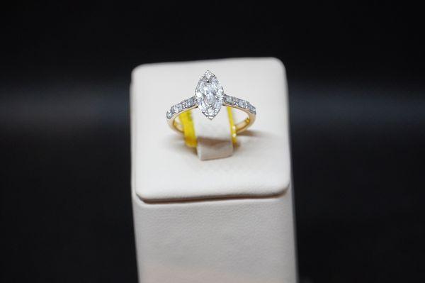 Gold and diamond ring