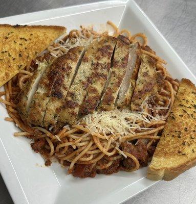 Chicken Parmesan over spaghetti