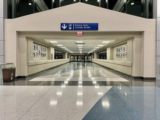 Follow the signs to parking, taxis, and courtesy shuttle.