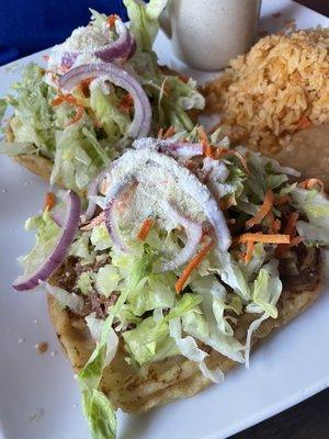 Shredded beef sopes with rice and beans meal