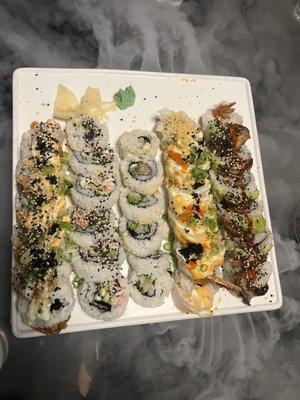 Geisha roll (far left), yellowtail roll (middle)