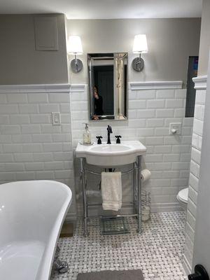 Early 20th century inspired bathroom. We were going for a classic look that won't go out of style.