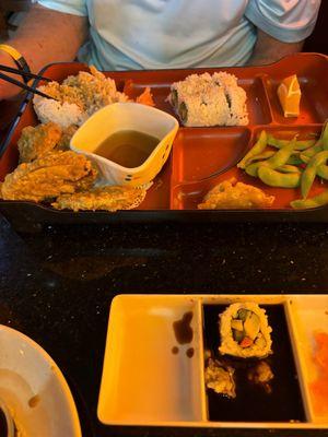 This is the lunch plate with veggie tempura and veggie roll.