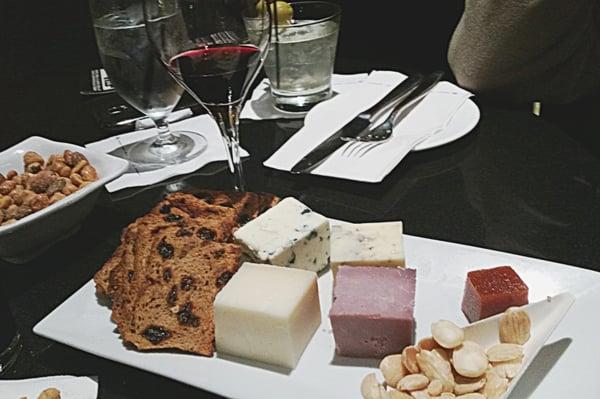 Cheese plate with Quince paste,  Marconi almonds,  raisin toast