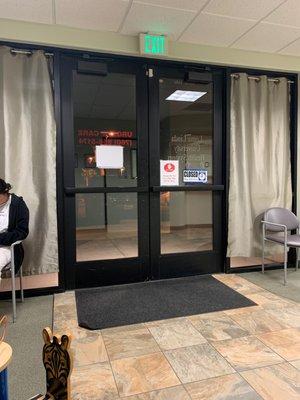 Waiting room view of entrance doors.