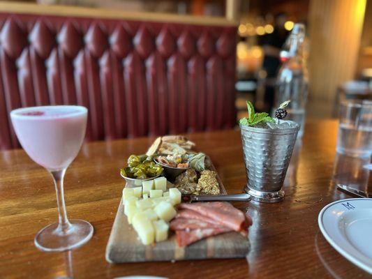 Charcuterie board with Second Breakfast drink and  Blackberry drink.