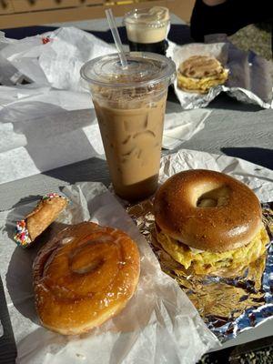 Cold brew, nitro cold brew, breakfast sandwiches, and fresh baked fluffy bun and cannoli.