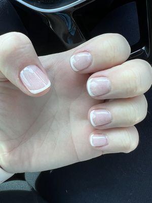 My nails (I asked for natural/clear nail base, that's why it looks different than example photo)