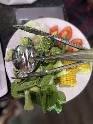 Tomatoes, corn, bok choy, spinach, onions