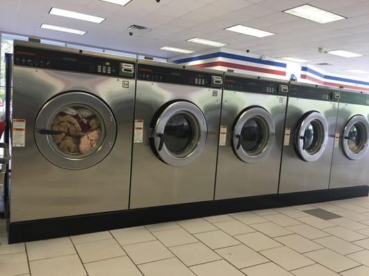 These large washers can hold two queen comforters and two queen sheet sets at once.