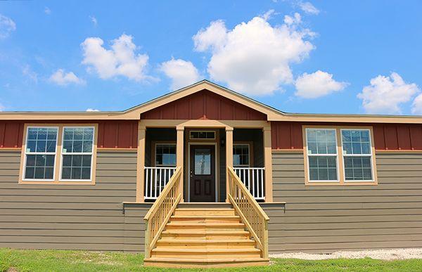 The Hacienda is favorite with this built in porch and wide open living area!