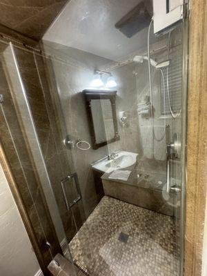 The bathroom area was clean. The shower is nice and spacious..