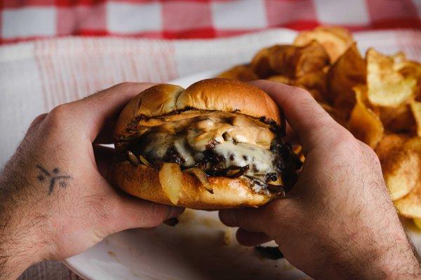 -- Smash Burger --
6oz all beef patty, grilled onions, mushroom, Swiss, and our tangy house sauce served on a brioche bun