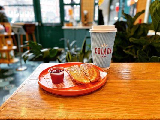 Tostada - traditional toasted cuban bread with butter & a delicious guava marmalade.