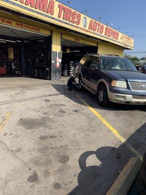 Alex fixing my tire