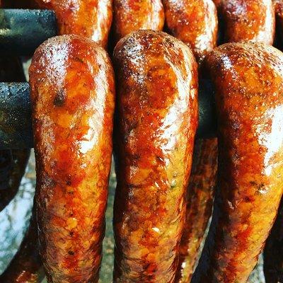 Homemade smoked sausage, made by hand and smoked with real wood in our old fashioned smokehouse.