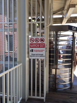 Make the CTA exit to the street more stroller and bike friendly. The Kinzie protected bike lane is directly below this stupid sign.