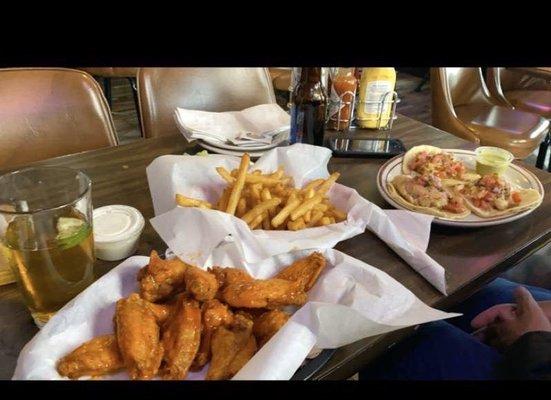 Wings, fries, & fish tacos