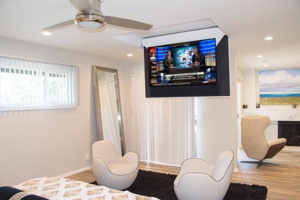 Motorized swing down 65" tv with custom soundbar