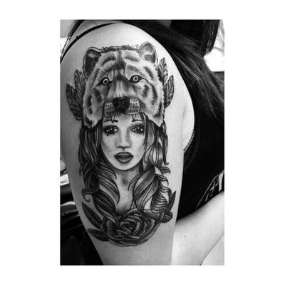 Girl with a wolf hat done by Erick