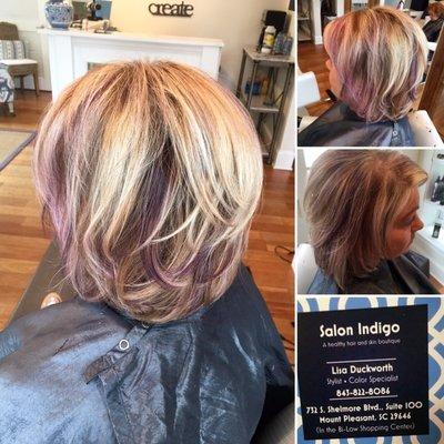 Ice Blonde with Violet purple peek a boo piece's and a short layered mid length haircut