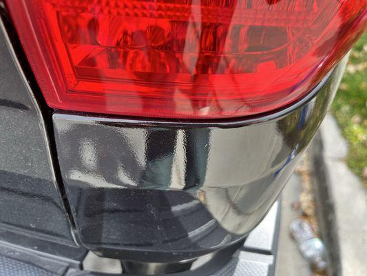 Orange peel easily visible under rear taillight. No effort was made to wet sand/polish out imperfections.