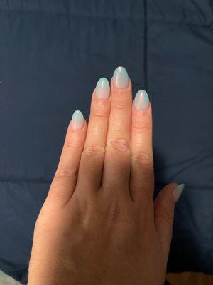 Ombré with a chrome finish on two nails.