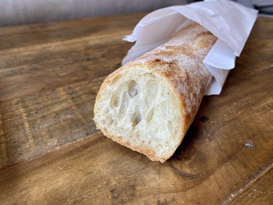 Textbook baguette with open crumb and an explosive crust that will leave your cutting board and environs strewn with crunchy debris.