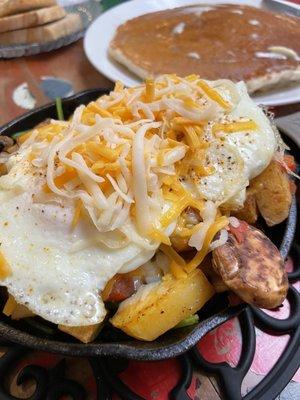 Breakfast Skillet with Bacon and over-easy eggs