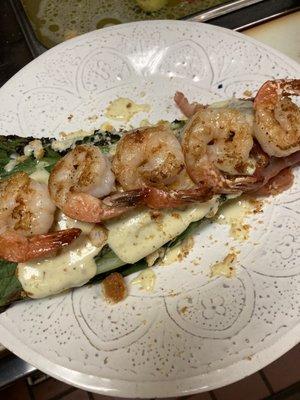 Grilled romaine heart wrapped w prosciutto topped with shrimp