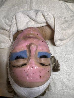 Client resting with Hydrating Rose mask and a Eyelash and Brow tint!