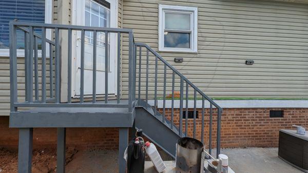 Stairs that were built in the shop and painted delivered and set up