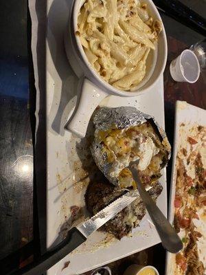 Filet, loaded baked potato, with Mac and cheese as a side