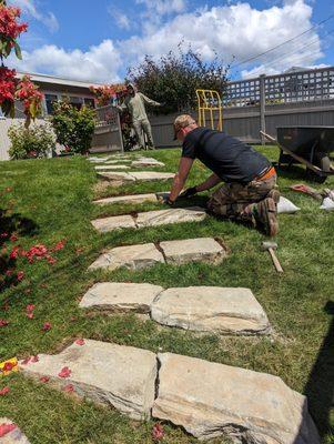 Installed these stepping stones into a lawn with a slope.