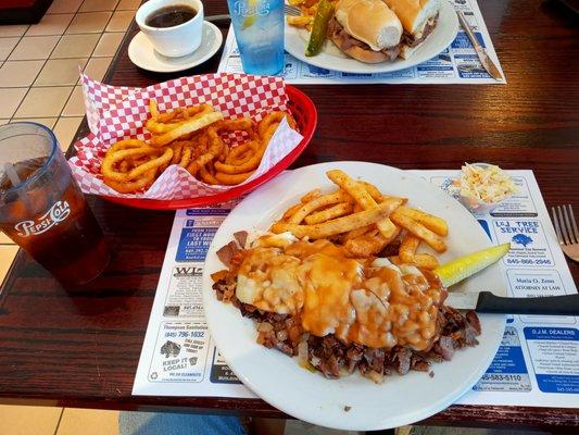 Cajun Steak & Gravy with fries and a side of onion rings.