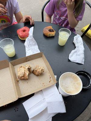 Donuts, coffee, scone, lemonade