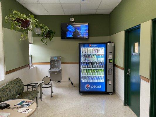 Smaller area of the lobby with drinks to purchase. Bring your own re-usable bottle to refill.