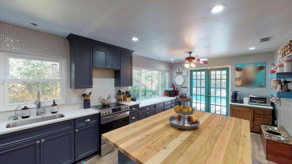 Large windows and a generous footprint in this kitchen in Shadow Wood