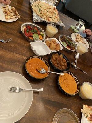 Garlic naan, chicken tiki masala, butter chicken, chicken curry, Dhaga Kabab, tanduri chicken, samosas