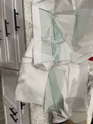 Shattered glass shelves to cabinet