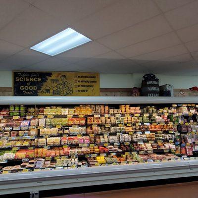 Refrigerated Wall of Organized Pasta, Meats, Cheese, Olives, Sauces, Dips, Spreads and other International items. 7-13-2013