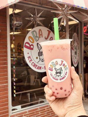 Strawberry milk tea with strawberry popping bubbles