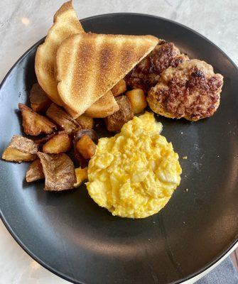 The Traditional (scrambled eggs with cheese, sausages and breakfast potatoes)